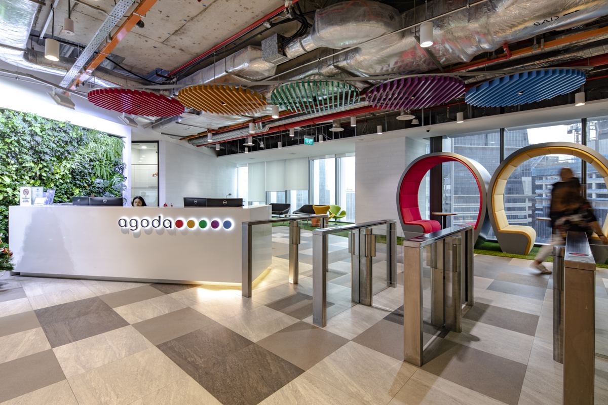Agoda reception with colour acoustic baffles, Singapore