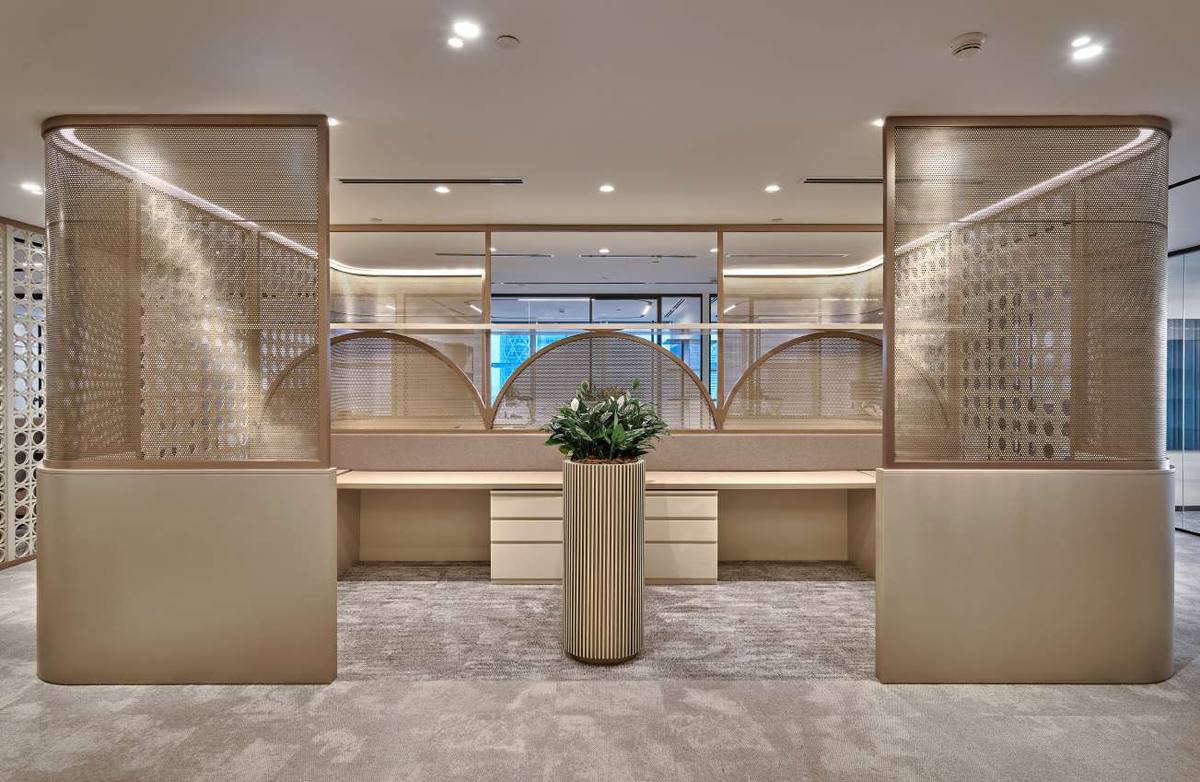White & Case reception, Abu Dhabi - arched perforated brass screens by Increation Interiors